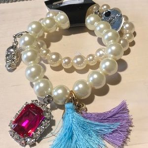 Double pearl bracelets with charms